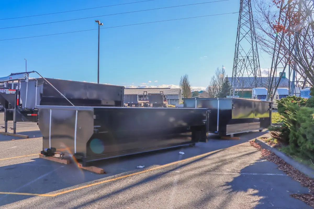 Roll-off dumpster ready for waste disposal at job site for Estate Cleanout Dumpster Rental in Pembroke
